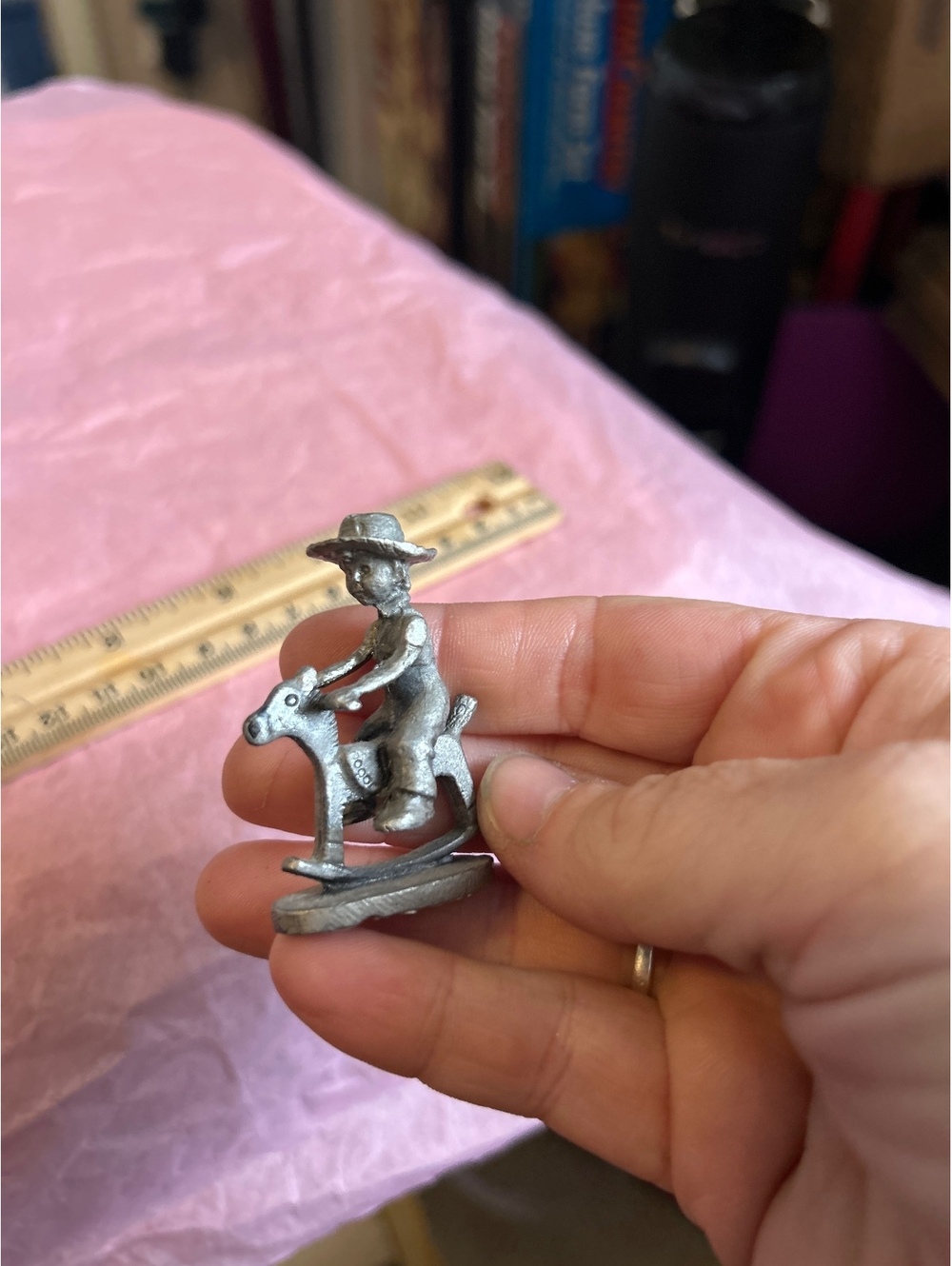 Pewter boy on rocking horse